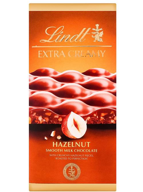 Шоколад молочный Экстра Крими с фундуком, Lindt, 80г фото